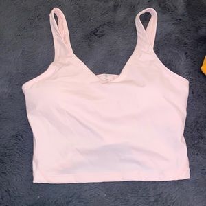 Exercise tank top with built in pads